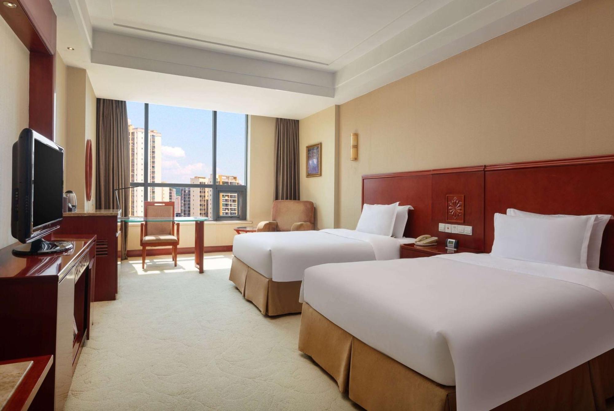 ホテル Ramada Plaza By Wyndham Chongqing West エクステリア 写真